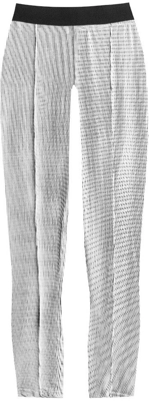 BŁYSZCZĄCE LEGGINSY W GEOMETRYCZNY WZÓR BIAŁO-CZARNE (316/1ART)