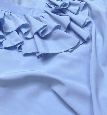 BLUZKA DAMSKA Z FALBANAMI NIEBIESKA (694ART)