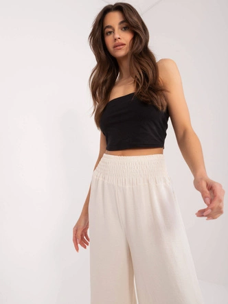 Szerokie spodnie damskie w gumę kremowe (8390)