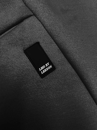 Luźna długa bluza damska ze ściągaczami czarna (AMG-332A)