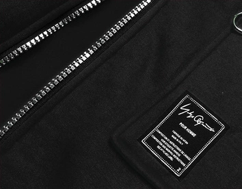 Prosta bluza damska z ozdobnym suwakiem czarna (AMG-37)