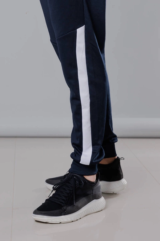 Męskie spodnie dresowe z wstawkami granat-biały (8K172)