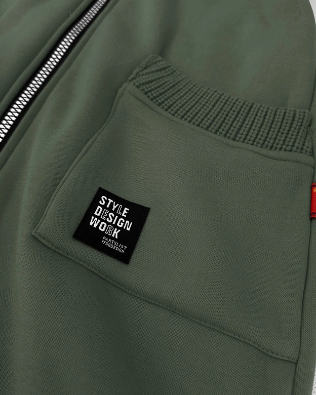 Damska bluza ze swetrowymi wstawkami LHD szarozielona (AMG-172A)