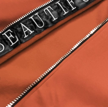 PROSTA BLUZA DAMSKA Z OZDOBNYM SUWAKIEM RUDA (AMG-37)